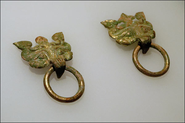 Ancient Chinese bronze doorknockers, July 2025, Perth